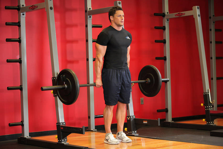 Barbell Shrug Behind The Back demonstration