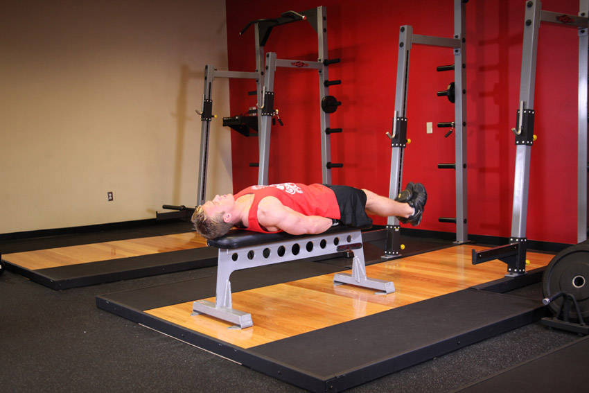 Flat Bench Lying Leg Raise demonstration