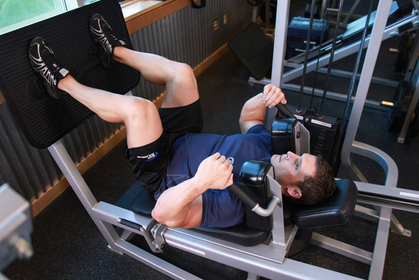 Lying Machine Squat demonstration