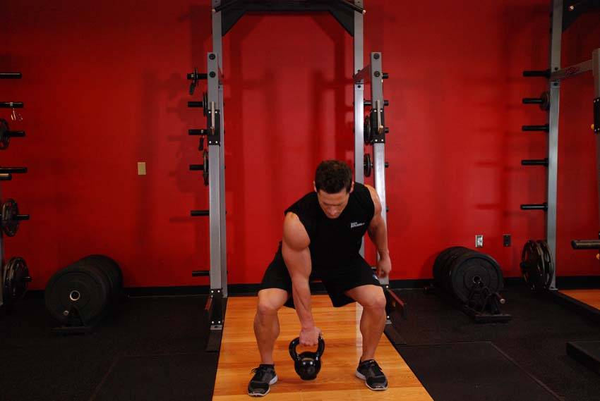 One-Arm Open Palm Kettlebell Clean demonstration