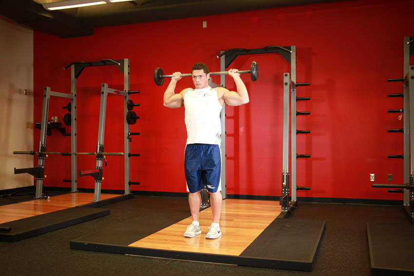Standing Barbell Press Behind Neck demonstration