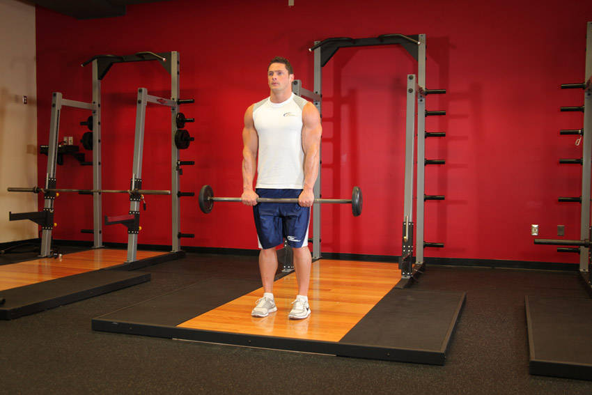 Standing Front Barbell Raise Over Head demonstration
