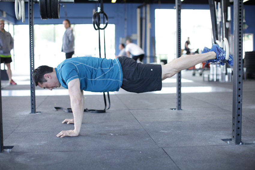 Suspended Reverse Crunch demonstration