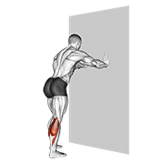 calf stretch with hands against wall demonstration